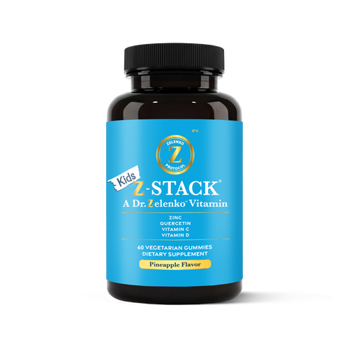 Bottle of Kids Z-Stack vitamins with blue label and black cap on white background